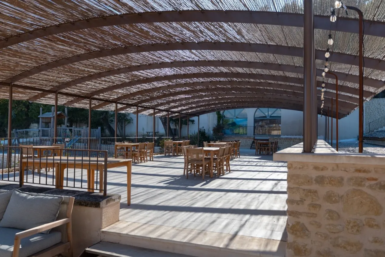 The covered terrace, set for lunch